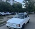 Белый Опель Корса, объемом двигателя 1 л и пробегом 245 тыс. км за 381 $, фото 1 на Automoto.ua