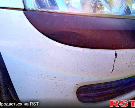 Белый Опель Корса, объемом двигателя 1 л и пробегом 254 тыс. км за 3100 $, фото 3 на Automoto.ua