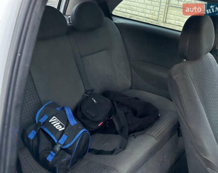 Белый Опель Корса, объемом двигателя 1.2 л и пробегом 198 тыс. км за 1550 $, фото 6 на Automoto.ua