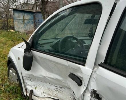 Белый Опель Корса, объемом двигателя 1.2 л и пробегом 270 тыс. км за 1200 $, фото 2 на Automoto.ua