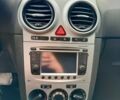 Белый Опель Корса, объемом двигателя 1.23 л и пробегом 250 тыс. км за 4000 $, фото 5 на Automoto.ua