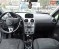 Белый Опель Корса, объемом двигателя 1.23 л и пробегом 164 тыс. км за 5850 $, фото 7 на Automoto.ua