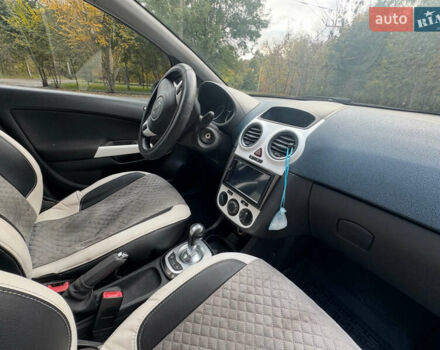 Белый Опель Корса, объемом двигателя 1.23 л и пробегом 179 тыс. км за 6000 $, фото 6 на Automoto.ua