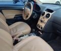 Білий Опель Корса, об'ємом двигуна 1.2 л та пробігом 300 тис. км за 6491 $, фото 1 на Automoto.ua