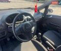 Білий Опель Корса, об'ємом двигуна 1.23 л та пробігом 250 тис. км за 5800 $, фото 7 на Automoto.ua