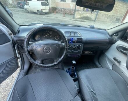 Білий Опель Корса, об'ємом двигуна 1.2 л та пробігом 210 тис. км за 1850 $, фото 2 на Automoto.ua