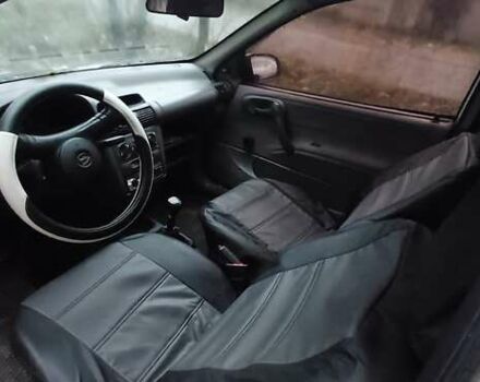 Белый Опель Корса, объемом двигателя 1.2 л и пробегом 450 тыс. км за 1179 $, фото 1 на Automoto.ua