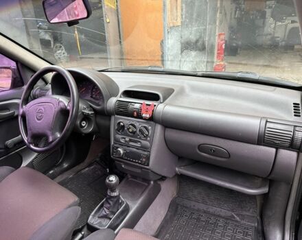 Чорний Опель Корса, об'ємом двигуна 1.6 л та пробігом 310 тис. км за 1600 $, фото 3 на Automoto.ua