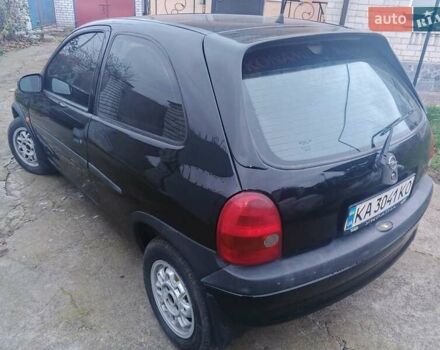 Черный Опель Корса, объемом двигателя 1.2 л и пробегом 235 тыс. км за 2200 $, фото 7 на Automoto.ua