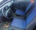 Черный Опель Корса, объемом двигателя 1.2 л и пробегом 235 тыс. км за 2200 $, фото 5 на Automoto.ua