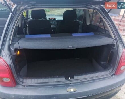 Черный Опель Корса, объемом двигателя 1.2 л и пробегом 235 тыс. км за 2200 $, фото 10 на Automoto.ua