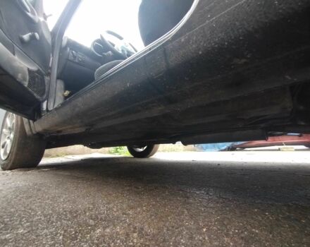 Черный Опель Корса, объемом двигателя 1 л и пробегом 1000 тыс. км за 1100 $, фото 3 на Automoto.ua