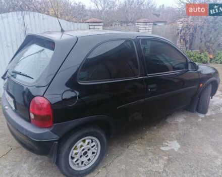 Черный Опель Корса, объемом двигателя 1.2 л и пробегом 235 тыс. км за 2200 $, фото 2 на Automoto.ua