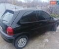 Черный Опель Корса, объемом двигателя 1.2 л и пробегом 235 тыс. км за 2200 $, фото 2 на Automoto.ua