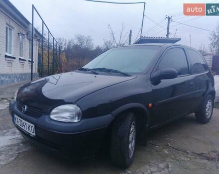 Черный Опель Корса, объемом двигателя 1.2 л и пробегом 235 тыс. км за 2200 $, фото 12 на Automoto.ua