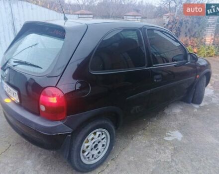 Черный Опель Корса, объемом двигателя 1.2 л и пробегом 235 тыс. км за 2200 $, фото 1 на Automoto.ua