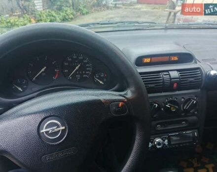 Черный Опель Корса, объемом двигателя 1.2 л и пробегом 235 тыс. км за 2200 $, фото 8 на Automoto.ua