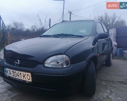 Черный Опель Корса, объемом двигателя 1.2 л и пробегом 235 тыс. км за 2200 $, фото 3 на Automoto.ua