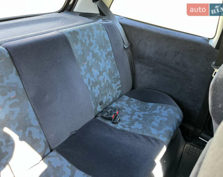 Черный Опель Корса, объемом двигателя 1.2 л и пробегом 400 тыс. км за 2400 $, фото 5 на Automoto.ua