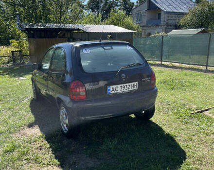 Черный Опель Корса, объемом двигателя 1.2 л и пробегом 400 тыс. км за 2400 $, фото 1 на Automoto.ua
