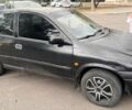 Черный Опель Корса, объемом двигателя 1.2 л и пробегом 387 тыс. км за 1000 $, фото 1 на Automoto.ua
