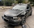 Черный Опель Корса, объемом двигателя 1.2 л и пробегом 387 тыс. км за 1000 $, фото 1 на Automoto.ua