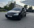 Черный Опель Корса, объемом двигателя 0.97 л и пробегом 290 тыс. км за 2600 $, фото 1 на Automoto.ua