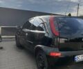 Черный Опель Корса, объемом двигателя 0.97 л и пробегом 290 тыс. км за 2600 $, фото 4 на Automoto.ua