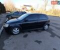 Черный Опель Корса, объемом двигателя 1.2 л и пробегом 300 тыс. км за 2700 $, фото 1 на Automoto.ua
