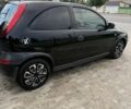 Черный Опель Корса, объемом двигателя 1.2 л и пробегом 237 тыс. км за 3500 $, фото 1 на Automoto.ua