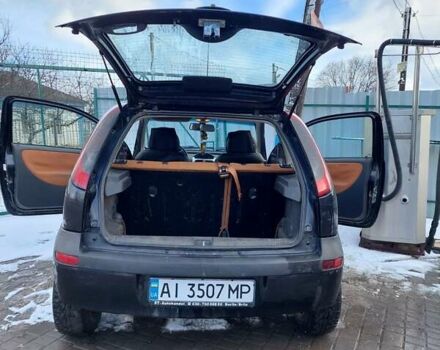 Черный Опель Корса, объемом двигателя 1.2 л и пробегом 140 тыс. км за 3200 $, фото 4 на Automoto.ua