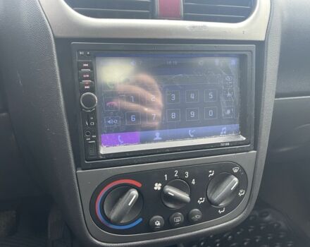 Черный Опель Корса, объемом двигателя 1 л и пробегом 250 тыс. км за 2650 $, фото 5 на Automoto.ua