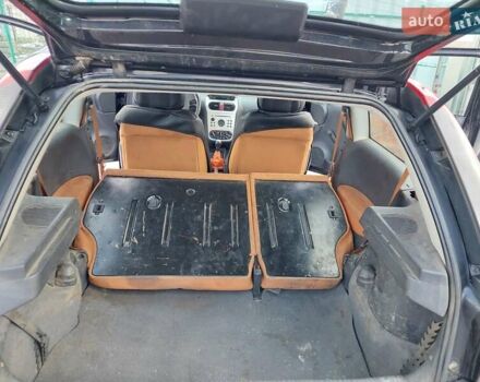 Черный Опель Корса, объемом двигателя 1.2 л и пробегом 140 тыс. км за 3200 $, фото 5 на Automoto.ua