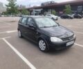 Черный Опель Корса, объемом двигателя 1.2 л и пробегом 180 тыс. км за 2391 $, фото 1 на Automoto.ua