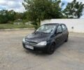 Черный Опель Корса, объемом двигателя 1 л и пробегом 223 тыс. км за 1450 $, фото 3 на Automoto.ua