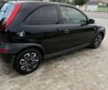 Черный Опель Корса, объемом двигателя 1.2 л и пробегом 237 тыс. км за 3700 $, фото 1 на Automoto.ua