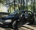 Черный Опель Корса, объемом двигателя 1.2 л и пробегом 208 тыс. км за 3206 $, фото 2 на Automoto.ua
