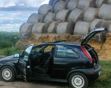 Черный Опель Корса, объемом двигателя 1 л и пробегом 215 тыс. км за 2300 $, фото 2 на Automoto.ua