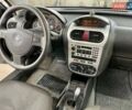 Черный Опель Корса, объемом двигателя 0.97 л и пробегом 260 тыс. км за 2999 $, фото 26 на Automoto.ua