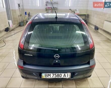 Черный Опель Корса, объемом двигателя 0.97 л и пробегом 260 тыс. км за 2999 $, фото 12 на Automoto.ua