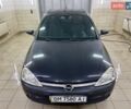 Черный Опель Корса, объемом двигателя 0.97 л и пробегом 260 тыс. км за 2499 $, фото 4 на Automoto.ua