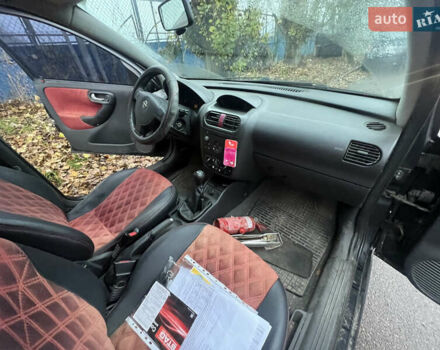 Черный Опель Корса, объемом двигателя 1.39 л и пробегом 280 тыс. км за 2200 $, фото 7 на Automoto.ua