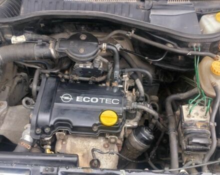 Черный Опель Корса, объемом двигателя 1 л и пробегом 215 тыс. км за 2300 $, фото 4 на Automoto.ua