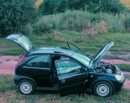 Черный Опель Корса, объемом двигателя 1 л и пробегом 215 тыс. км за 2300 $, фото 1 на Automoto.ua