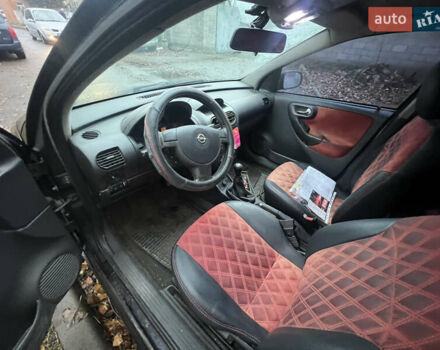 Черный Опель Корса, объемом двигателя 1.39 л и пробегом 280 тыс. км за 2200 $, фото 6 на Automoto.ua