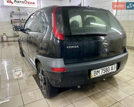 Черный Опель Корса, объемом двигателя 0.97 л и пробегом 260 тыс. км за 2999 $, фото 14 на Automoto.ua