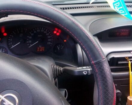 Черный Опель Корса, объемом двигателя 1.4 л и пробегом 360 тыс. км за 2500 $, фото 2 на Automoto.ua