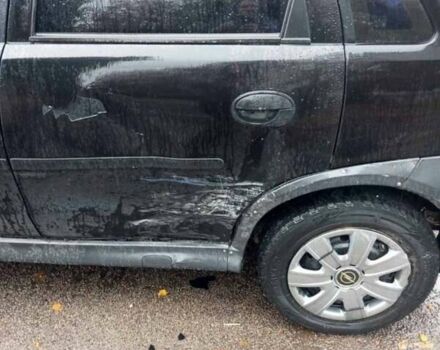 Черный Опель Корса, объемом двигателя 1.39 л и пробегом 365 тыс. км за 2500 $, фото 3 на Automoto.ua