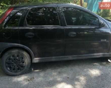 Черный Опель Корса, объемом двигателя 1.39 л и пробегом 365 тыс. км за 2500 $, фото 2 на Automoto.ua