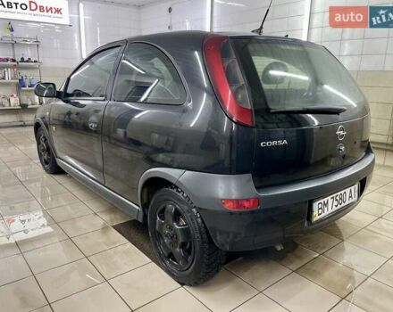 Черный Опель Корса, объемом двигателя 0.97 л и пробегом 260 тыс. км за 2999 $, фото 15 на Automoto.ua